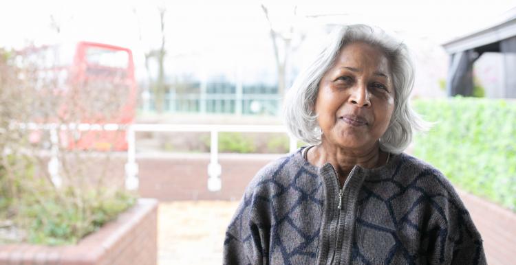 Volunteer woman standing in car park