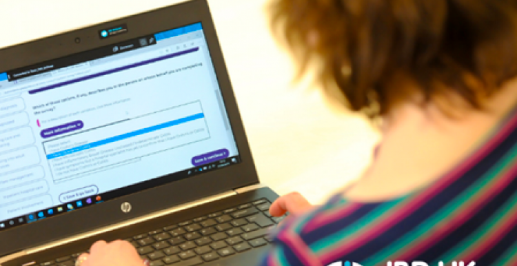 woman typing on computer