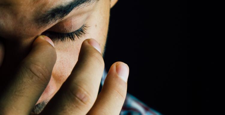 Adult man face sad worried anxious depression 