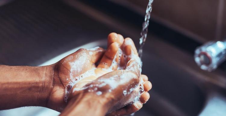 Wash your hands with soap and hot water Washing hands under a tap (Getty Images)