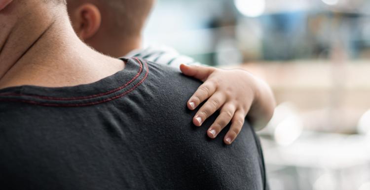 Father holding his son