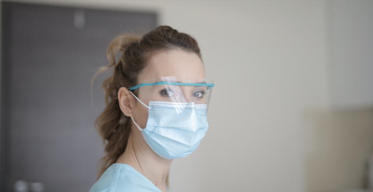doctor with mask PPE covid