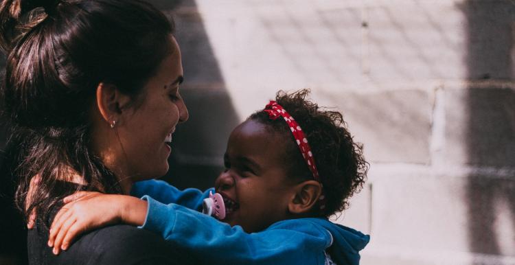 woman holding baby