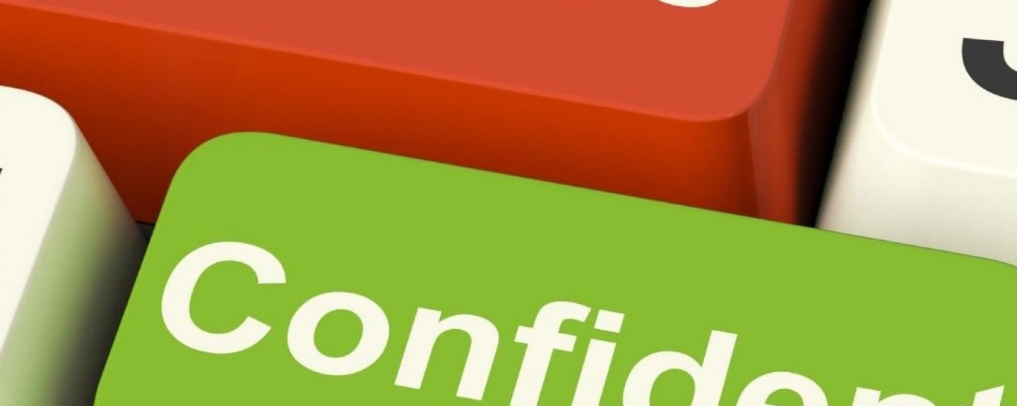 Computer buttons with 'nervous' in red and 'confident' in green
