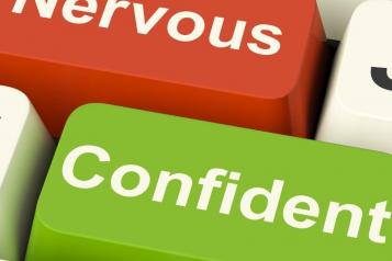 Computer buttons with 'nervous' in red and 'confident' in green