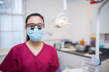 dentist with mask in clinic PPE