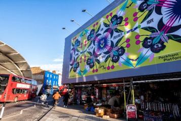 Photo of Peckham platform with colourful display of art