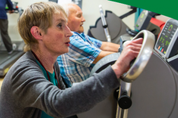 Older people using gym equipment
