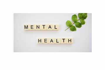 Mental health written in scrabble tiles and leaf