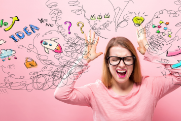 woman in anguish surrendered by doodles depicting different stressors
