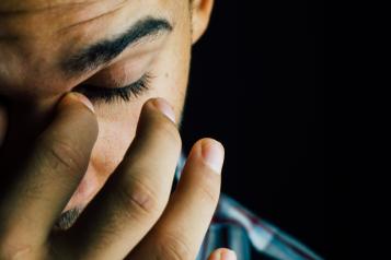 Adult man face sad worried anxious depression 