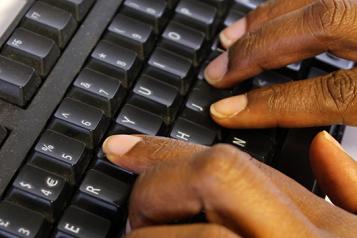 Hands typing on keyboard