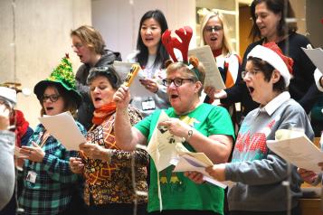 Choir singing dress in christmas hats