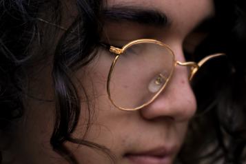 close up of woman with glasses