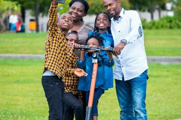 family taking pics in the park.jpg