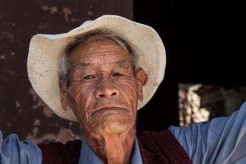 Chinese man with straw hat