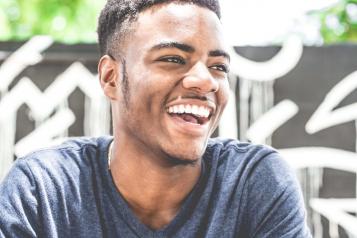 Young man laughing