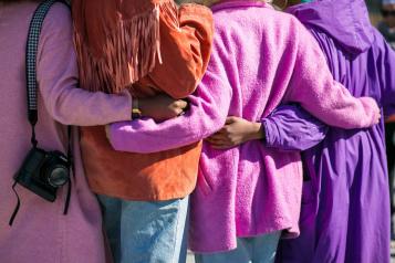 Close up of women embracing