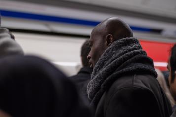 man at tube station