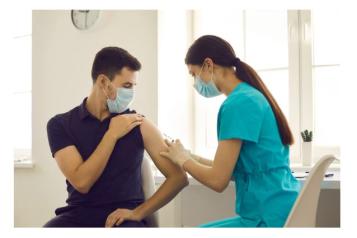 Man receiving a vaccine