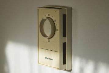 Thermostat on wall