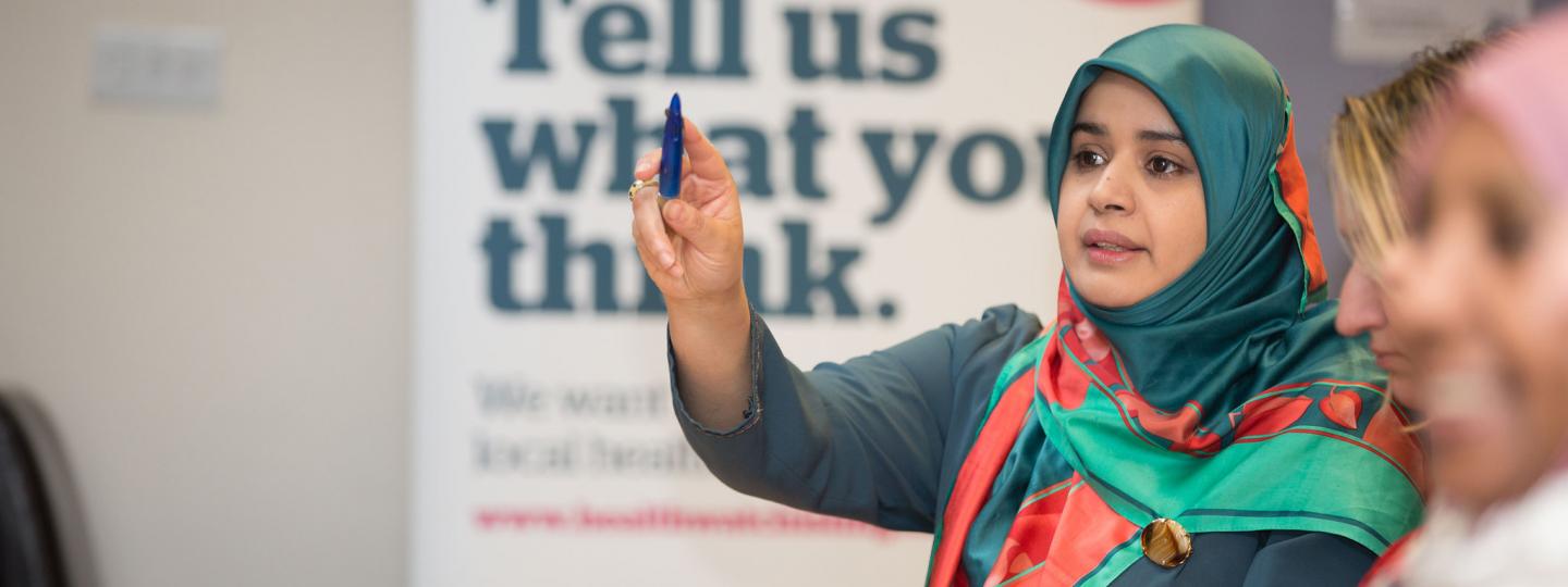 woman healthwatch event volunteer