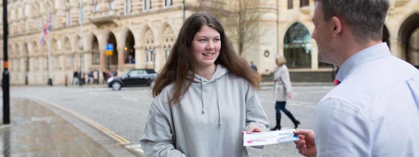Young volunteers asking people their views