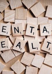 scrabble pieces spelling out mental health