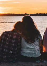 4 women looking towards to the sunset